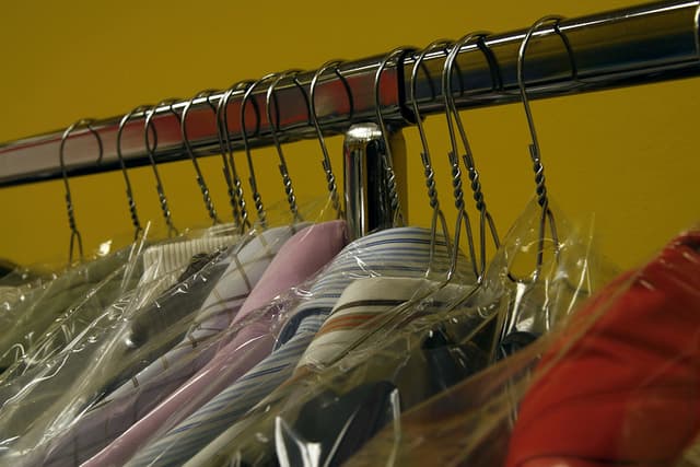 Dry cleaner's rack with plastic